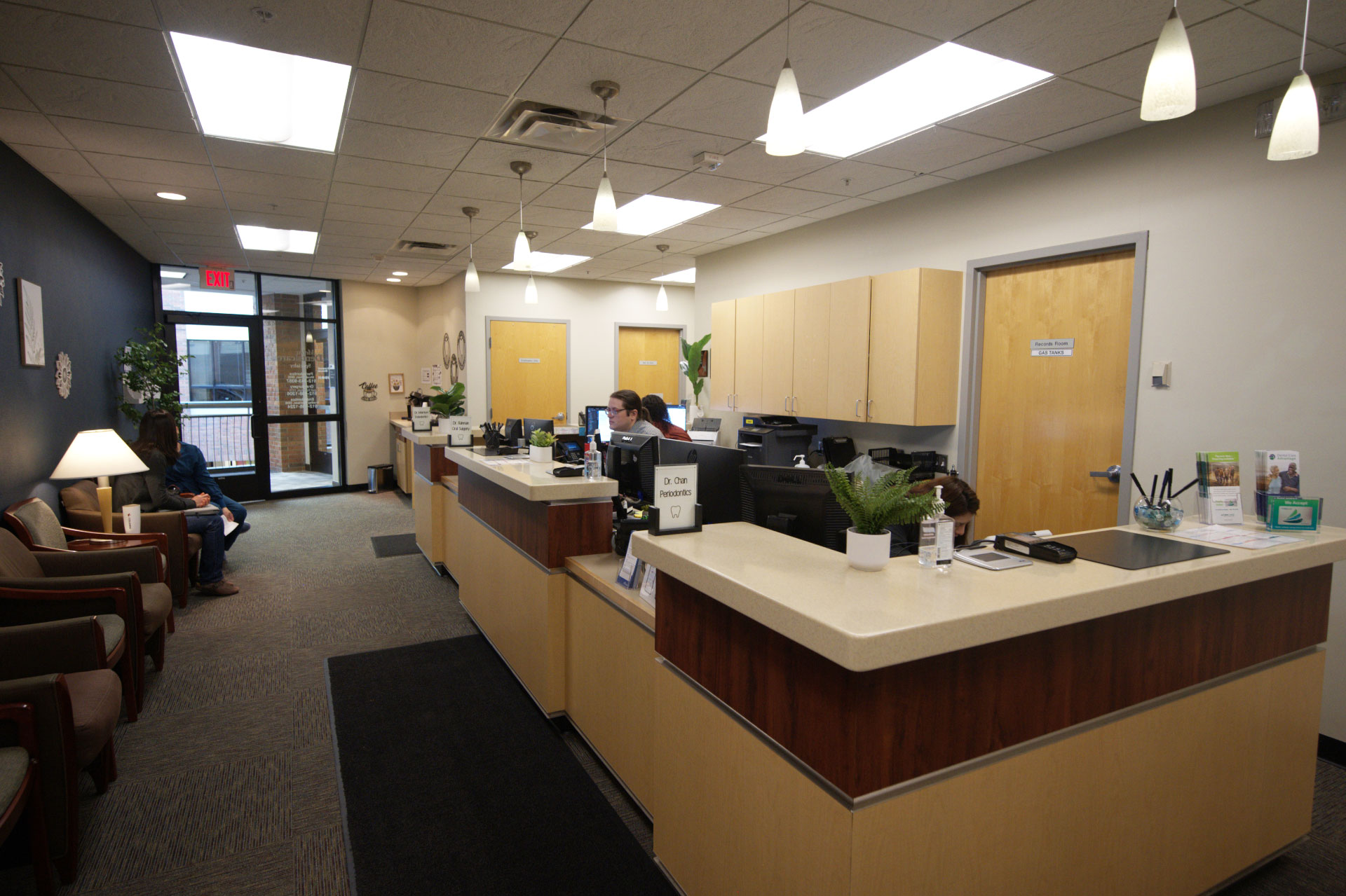 front desk area with seating for patients